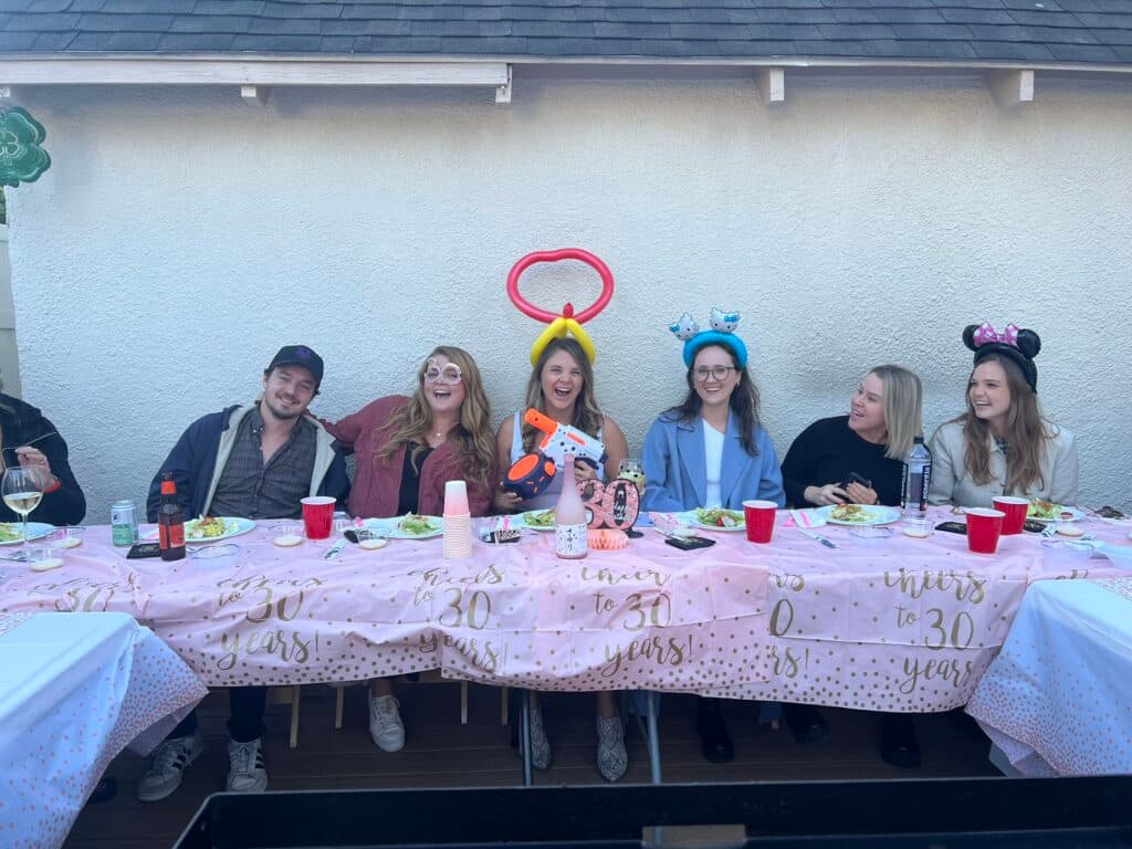 hibachi catering guests seated around the grill at home